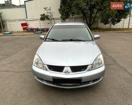 Серый Мицубиси Лансер, объемом двигателя 1.58 л и пробегом 183 тыс. км за 4800 $, фото 1 на Automoto.ua
