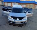 Сірий Міцубісі Lancer, об'ємом двигуна 1.58 л та пробігом 207 тис. км за 4300 $, фото 1 на Automoto.ua