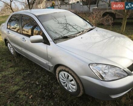 Серый Мицубиси Лансер, объемом двигателя 1.6 л и пробегом 234 тыс. км за 4300 $, фото 1 на Automoto.ua