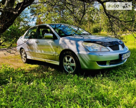 Сірий Міцубісі Lancer, об'ємом двигуна 1.6 л та пробігом 203 тис. км за 5000 $, фото 2 на Automoto.ua