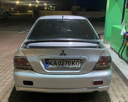 Сірий Міцубісі Lancer, об'ємом двигуна 2 л та пробігом 255 тис. км за 3500 $, фото 1 на Automoto.ua