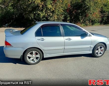 Сірий Міцубісі Lancer, об'ємом двигуна 1.6 л та пробігом 226 тис. км за 4000 $, фото 6 на Automoto.ua