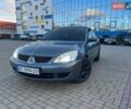 Серый Мицубиси Лансер, объемом двигателя 1.6 л и пробегом 279 тыс. км за 3990 $, фото 1 на Automoto.ua