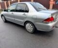 Сірий Міцубісі Lancer, об'ємом двигуна 1.58 л та пробігом 333 тис. км за 2750 $, фото 5 на Automoto.ua