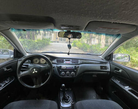 Сірий Міцубісі Lancer, об'ємом двигуна 1.6 л та пробігом 333 тис. км за 2600 $, фото 7 на Automoto.ua