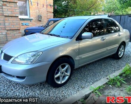 Серый Мицубиси Лансер, объемом двигателя 1.6 л и пробегом 0 тыс. км за 3999 $, фото 1 на Automoto.ua