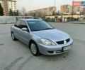 Сірий Міцубісі Lancer, об'ємом двигуна 2 л та пробігом 199 тис. км за 4400 $, фото 2 на Automoto.ua