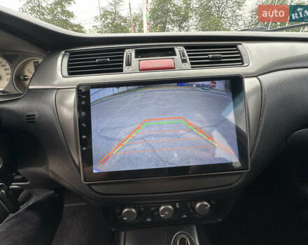 Серый Мицубиси Лансер, объемом двигателя 1.58 л и пробегом 183 тыс. км за 4800 $, фото 30 на Automoto.ua