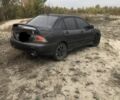 Міцубісі Lancer 2006 у Синельниковом на Automoto.ua Сірий Міцубісі Lancer, об'ємом двигуна 2 л та пробігом 200 тис. км за 3000 $, фото 2 на Automoto.ua