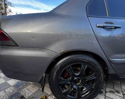 Сірий Міцубісі Lancer, об'ємом двигуна 0 л та пробігом 279 тис. км за 3700 $, фото 14 на Automoto.ua