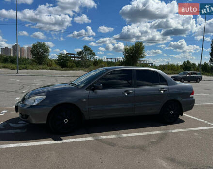 Сірий Міцубісі Lancer, об'ємом двигуна 1.6 л та пробігом 223 тис. км за 4500 $, фото 4 на Automoto.ua