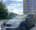 Серый Мицубиси Лансер, объемом двигателя 1.58 л и пробегом 160 тыс. км за 4600 $, фото 20 на Automoto.ua