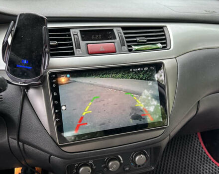 Сірий Міцубісі Lancer, об'ємом двигуна 2 л та пробігом 229 тис. км за 3800 $, фото 16 на Automoto.ua