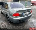 Сірий Міцубісі Lancer, об'ємом двигуна 1.6 л та пробігом 267 тис. км за 4500 $, фото 6 на Automoto.ua