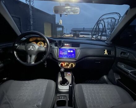 Серый Мицубиси Лансер, объемом двигателя 1.6 л и пробегом 213 тыс. км за 4450 $, фото 5 на Automoto.ua