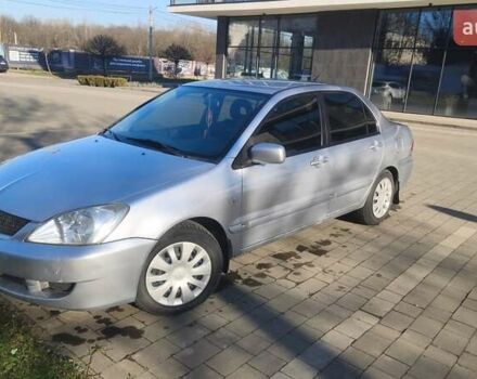 Сірий Міцубісі Lancer, об'ємом двигуна 1.6 л та пробігом 206 тис. км за 3800 $, фото 2 на Automoto.ua