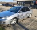 Сірий Міцубісі Lancer, об'ємом двигуна 1.6 л та пробігом 206 тис. км за 3800 $, фото 2 на Automoto.ua