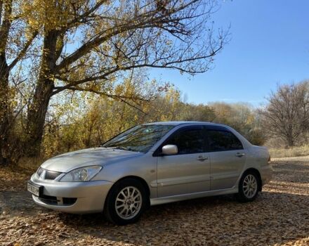 Серый Мицубиси Лансер, объемом двигателя 1.6 л и пробегом 204 тыс. км за 3999 $, фото 6 на Automoto.ua