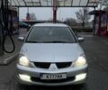 Сірий Міцубісі Lancer, об'ємом двигуна 2 л та пробігом 256 тис. км за 6700 $, фото 1 на Automoto.ua