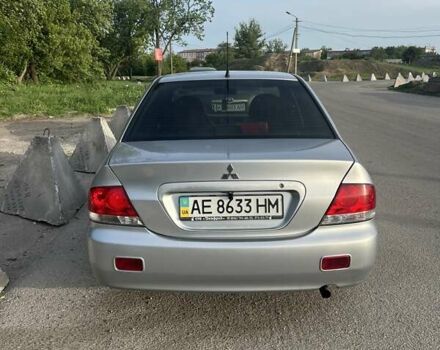 Сірий Міцубісі Lancer, об'ємом двигуна 1.58 л та пробігом 197 тис. км за 3450 $, фото 7 на Automoto.ua
