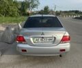 Сірий Міцубісі Lancer, об'ємом двигуна 1.58 л та пробігом 197 тис. км за 3450 $, фото 7 на Automoto.ua