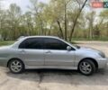 Серый Мицубиси Лансер, объемом двигателя 1.6 л и пробегом 195 тыс. км за 4800 $, фото 3 на Automoto.ua