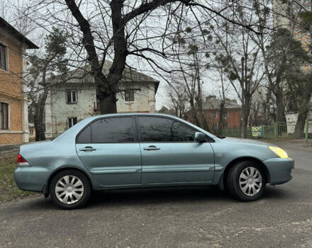 Сірий Міцубісі Lancer, об'ємом двигуна 1.6 л та пробігом 240 тис. км за 3000 $, фото 3 на Automoto.ua