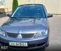Сірий Міцубісі Lancer, об'ємом двигуна 1.6 л та пробігом 125 тис. км за 3850 $, фото 1 на Automoto.ua