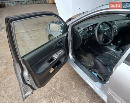 Серый Мицубиси Лансер, объемом двигателя 1.58 л и пробегом 215 тыс. км за 4000 $, фото 6 на Automoto.ua