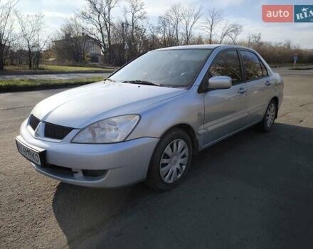 Серый Мицубиси Лансер, объемом двигателя 1.6 л и пробегом 344 тыс. км за 3400 $, фото 3 на Automoto.ua