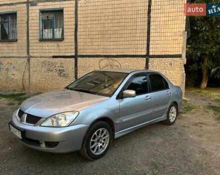 Сірий Міцубісі Lancer, об'ємом двигуна 1.6 л та пробігом 225 тис. км за 4200 $, фото 3 на Automoto.ua