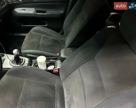 Серый Мицубиси Лансер, объемом двигателя 1.58 л и пробегом 300 тыс. км за 4600 $, фото 9 на Automoto.ua