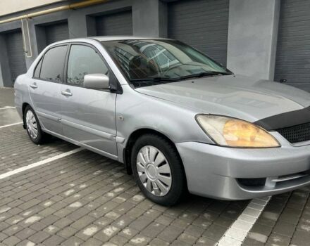 Серый Мицубиси Лансер, объемом двигателя 1.6 л и пробегом 333 тыс. км за 2800 $, фото 3 на Automoto.ua