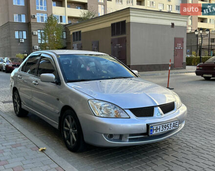 Серый Мицубиси Лансер, объемом двигателя 1.58 л и пробегом 244 тыс. км за 4950 $, фото 4 на Automoto.ua