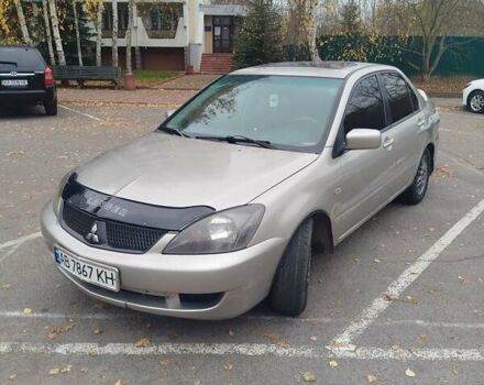 Сірий Міцубісі Lancer, об'ємом двигуна 2 л та пробігом 330 тис. км за 3450 $, фото 7 на Automoto.ua
