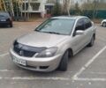 Сірий Міцубісі Lancer, об'ємом двигуна 2 л та пробігом 330 тис. км за 3450 $, фото 7 на Automoto.ua