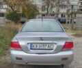 Серый Мицубиси Лансер, объемом двигателя 1.6 л и пробегом 209 тыс. км за 3500 $, фото 3 на Automoto.ua