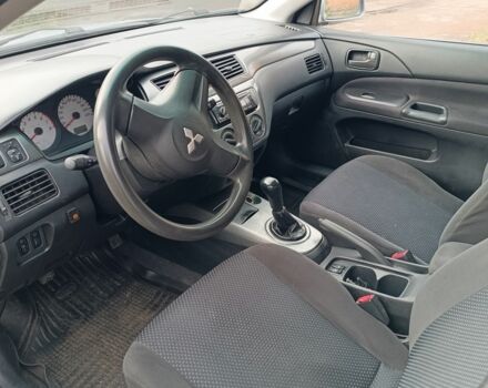Сірий Міцубісі Lancer, об'ємом двигуна 1.6 л та пробігом 267 тис. км за 3600 $, фото 6 на Automoto.ua