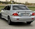 Серый Мицубиси Лансер, объемом двигателя 1.6 л и пробегом 230 тыс. км за 4450 $, фото 15 на Automoto.ua