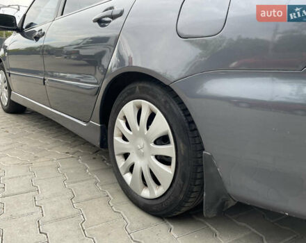 Сірий Міцубісі Lancer, об'ємом двигуна 1.58 л та пробігом 162 тис. км за 4650 $, фото 7 на Automoto.ua