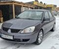 Сірий Міцубісі Lancer, об'ємом двигуна 1.59 л та пробігом 216 тис. км за 3200 $, фото 1 на Automoto.ua