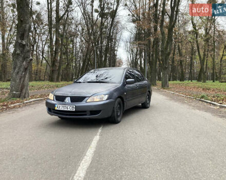 Сірий Міцубісі Lancer, об'ємом двигуна 1.6 л та пробігом 222 тис. км за 4900 $, фото 1 на Automoto.ua