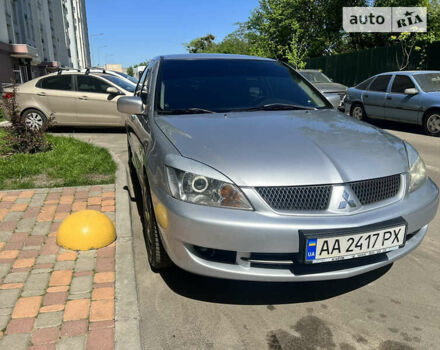 Сірий Міцубісі Lancer, об'ємом двигуна 1.58 л та пробігом 190 тис. км за 4900 $, фото 3 на Automoto.ua