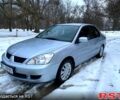 Сірий Міцубісі Lancer, об'ємом двигуна 1.6 л та пробігом 380 тис. км за 3199 $, фото 1 на Automoto.ua