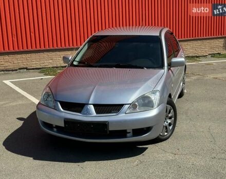 Серый Мицубиси Лансер, объемом двигателя 0 л и пробегом 182 тыс. км за 6500 $, фото 1 на Automoto.ua