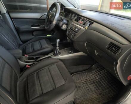Сірий Міцубісі Lancer, об'ємом двигуна 1.58 л та пробігом 186 тис. км за 4300 $, фото 1 на Automoto.ua