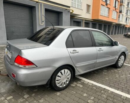 Серый Мицубиси Лансер, объемом двигателя 1.6 л и пробегом 333 тыс. км за 2800 $, фото 8 на Automoto.ua