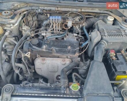 Серый Мицубиси Лансер, объемом двигателя 1.58 л и пробегом 250 тыс. км за 4700 $, фото 6 на Automoto.ua