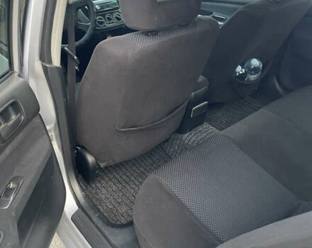 Сірий Міцубісі Lancer, об'ємом двигуна 1.58 л та пробігом 430 тис. км за 2550 $, фото 12 на Automoto.ua