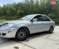 Серый Мицубиси Лансер, объемом двигателя 1.58 л и пробегом 185 тыс. км за 3200 $, фото 1 на Automoto.ua